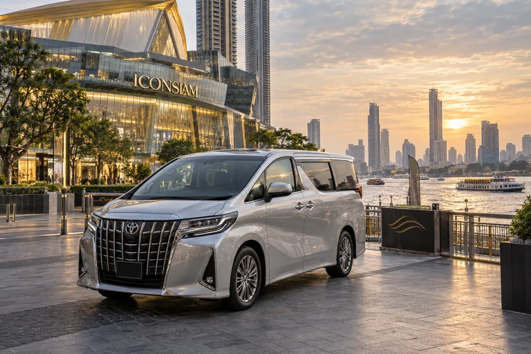Silver private minivan parked on the Bangkok riverside near ICONSIAM